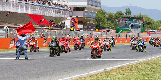 moto-gp-starting-grid-some-riders-racing-motogp-grand-prix-catalunya-june-montmelo-barcelona-spain-35086763.jpg